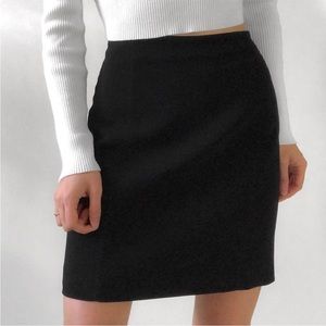 Bebe x Naven Short Skirt in Black